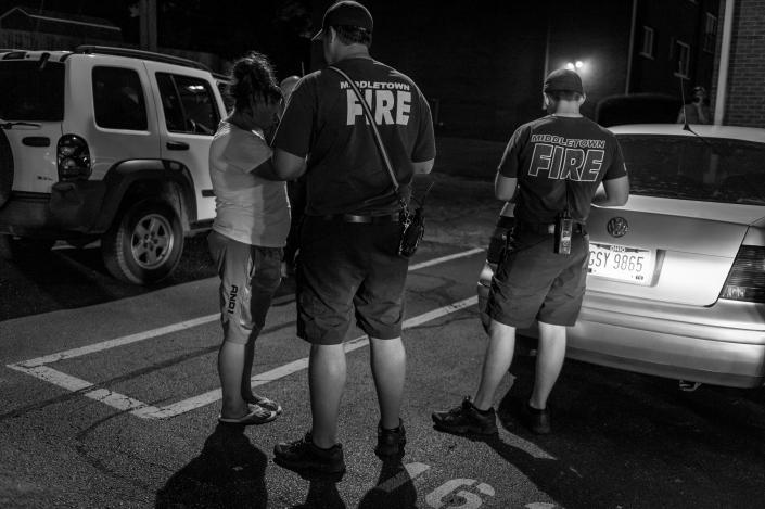 <p>Middletown Fire and Police Department personnel respond to a call about a woman possibly overdosing on heroin.<br> (Photograph by Mary F. Calvert for Yahoo News) </p>