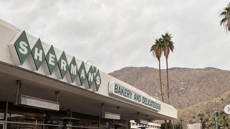 Sherman's Deli with palm trees in background