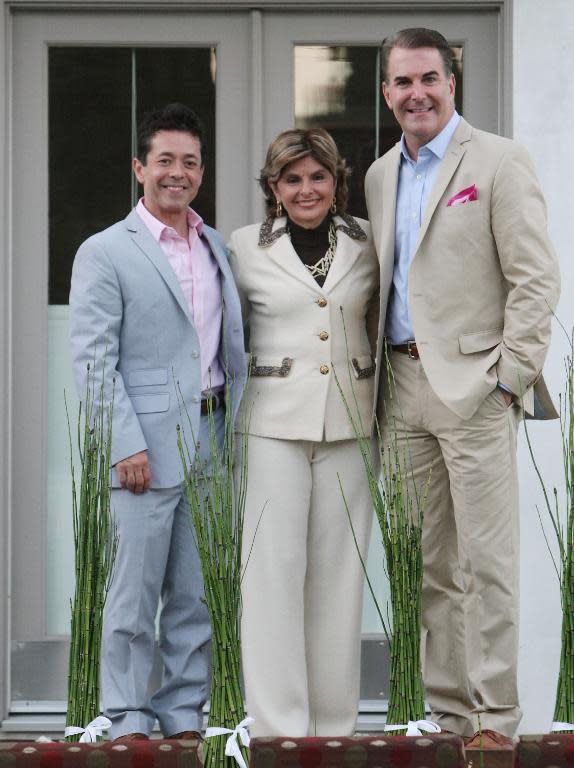 Celebrity lawyer Gloria Allred (C) pictured at the wedding of J Charles McFadden (L) and Daniel McFadden in West Hollywood, August 17, 2014