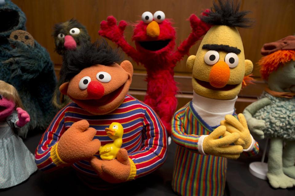 Bert and Ernie, as well as Elmo, center, are among a donation of additional Jim Henson objects to the Smithsonian's National Museum of American History in Washington, Tuesday, Sept. 24, 2013. Miss Piggy joined Kermit the Frog in the Smithsonian Institution’s collection of Jim Henson’s Muppets, and Bert and Ernie will have a place in history, too. Henson’s daughter, Cheryl Henson, is donating 20 more puppets and props to the National Museum of American History. (AP Photo/Jacquelyn Martin)