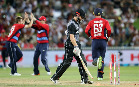 New Zealand's Kane Williamson (2nd R) walks off after being dismissed during the Twenty20 Tri Series - Credit: AFP/Getty Images