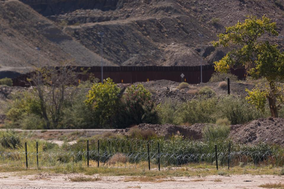 Texas National Guard troops placed concertina wire along the Rio Grande by Mount Cristo Rey in New Mexico and Texas.