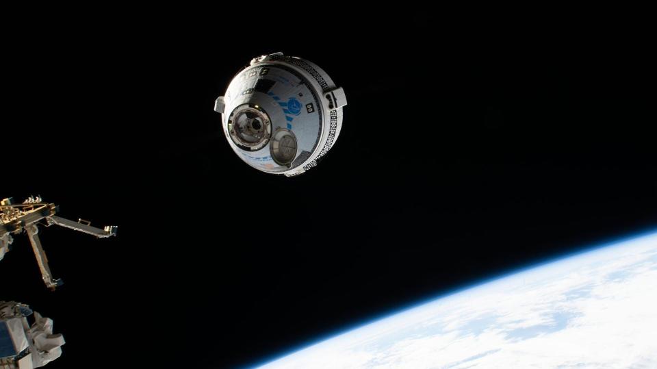 Boeing's CST-100 Starliner crew ship approaches the International Space Station on the company's Orbital Flight Test-2 mission before automatically docking to the Harmony module's forward port.