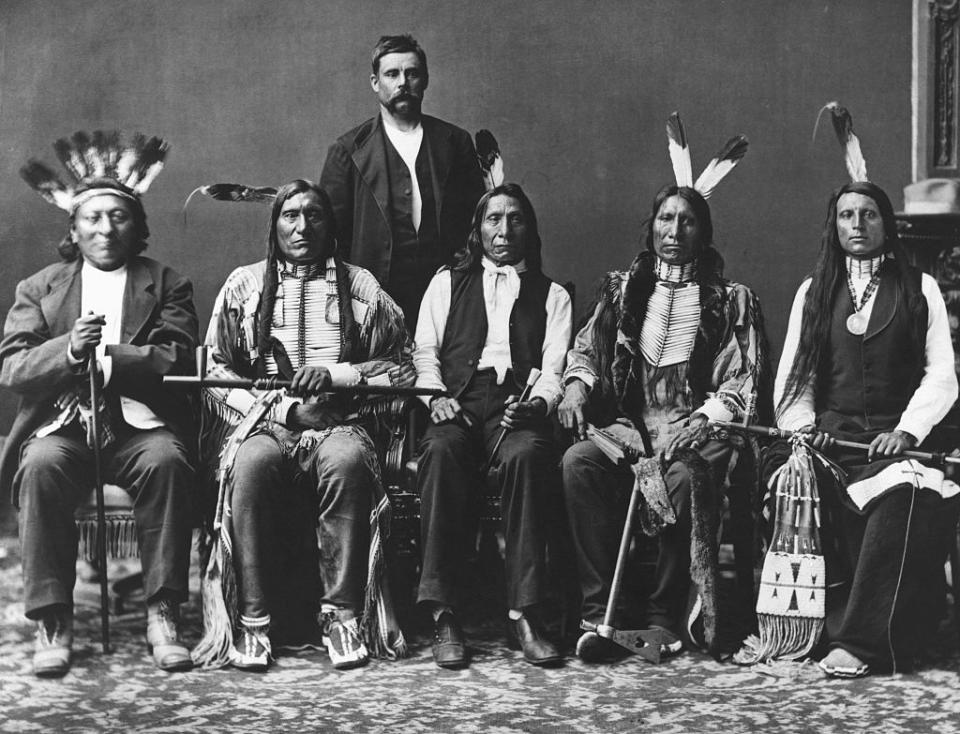 Members of the Red Cloud delegation, left to right: Red Dog, Little Wound, John Bridgeman (interpreter), Red Cloud, American Horse, and Red Shirt. Oglala Sioux Photograph before 1876.<span class="copyright">Bettmann Archive</span>