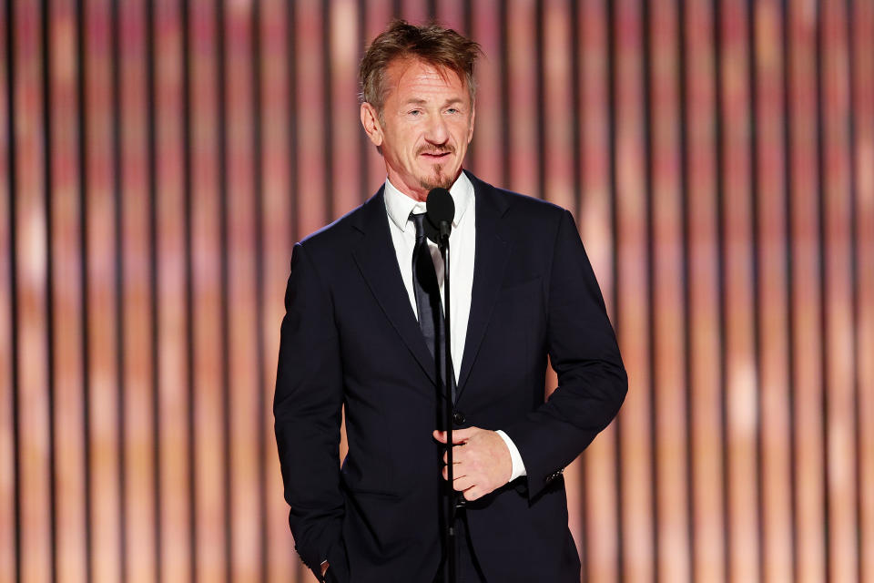 Sean Penn speaks onstage at the Golden Globes on Tuesday