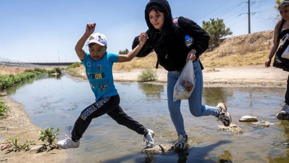 Migrants crossing the border in El Paso on 11 May