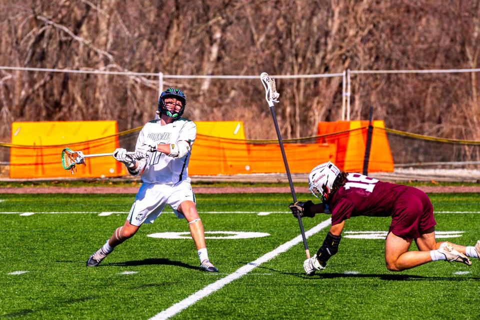 Dartmouth's Graham White fires on goal.