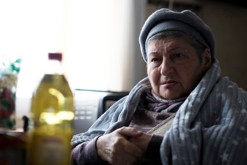 Holocaust survivor Maya Shulman, 88, speaks to Reuters after receiving a donation of food and a warm winter blanket from Chasdei Naomi, a non-profit organisation that provides help to thousands of Holocaust survivors in Israel, in Beit Shemesh, Israel