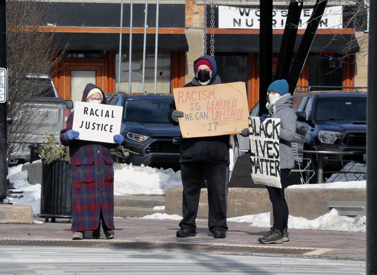 The Black Lives Matter daily protest movement hit Day 600 on the square in Wooster Friday. Linda Houston, Dan O'Rourke and Desiree Weber were among the seven people who braved the cold holding signs promoting police policy reform and community outreach.