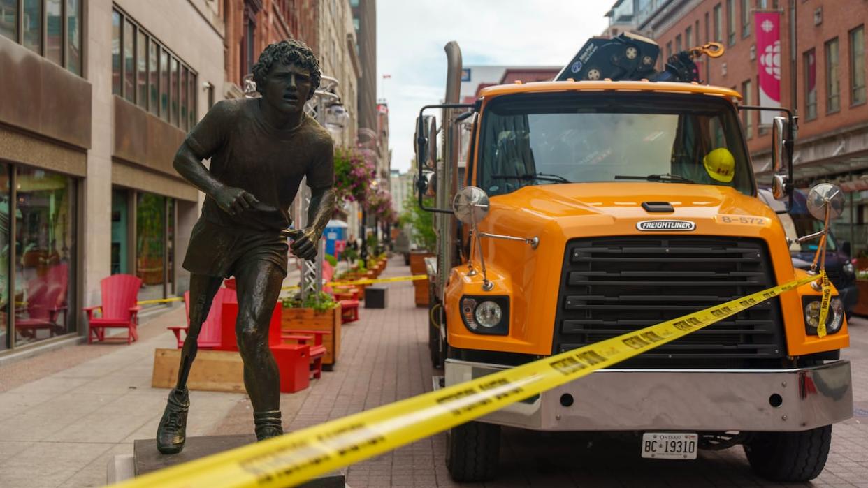 Downtown Ottawa's Terry Fox statue moved one street south from Wellington Street to Sparks Street on June 10, 2024. (Felix Desroches/CBC - image credit)