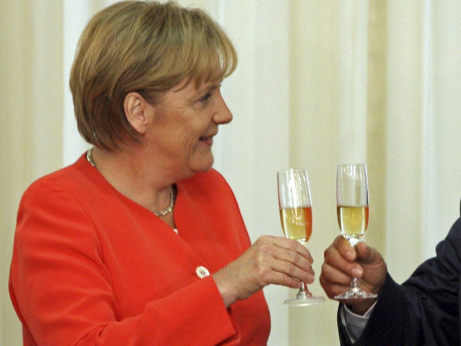 angela merkel champagne