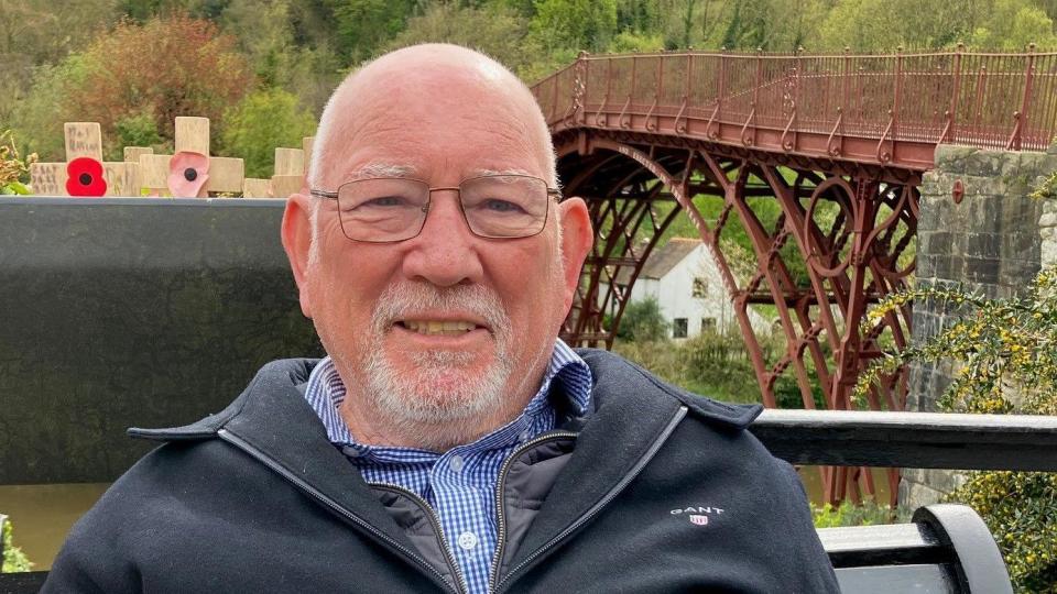 Tourist in front of the Ironbridge