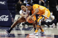Auburn guard Mar'shaun Bostic, left, tries to steal the ball from Tennessee guard Jordan Walker, right, during the second half of an NCAA college basketball game Thursday, Jan. 27, 2022, in Auburn, Ala. (AP Photo/Butch Dill)