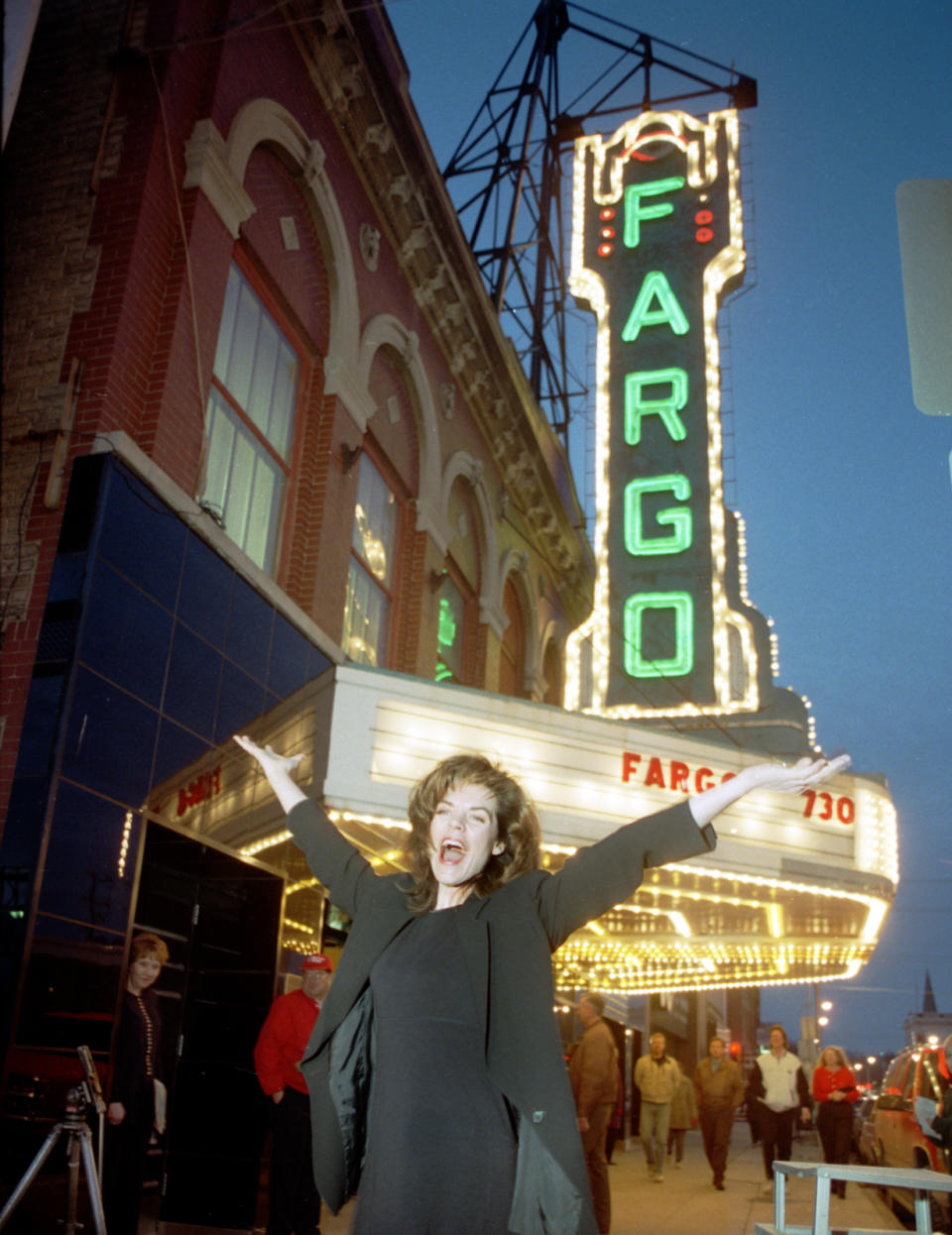 In this photo taken March 21, 1996, "Fargo" Actress Kristin Rudrud poses at the movie screening, in front of the Fargo Theatre in Fargo, N.D. When the movie Fargo debuted in 1996, many residents in the North Dakota city were not fans of the film’s dark humor, not to mention the heavy accents. But the fame and cash from the movie eventually brought many Fargo residents around. Now, 16 years later, Fargo awaits the debut of a new cable television show by the same name. And many residents are less apprehensive about how their hometown will be portrayed this time around. (AP Photo/The Forum, Nick Carlson)