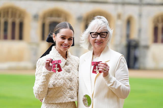 <p>Andrew Matthews - Pool/Getty</p> Emilia Clarke and Jennifer Clarke after being made Members of the Order of the British Empire during an investiture ceremony at Windsor Castle, on February 21