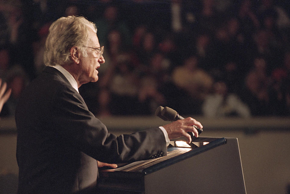 FILE - In this Sunday, April 23, 1995 file photo, the Rev. Billy Graham speaks to the capacity crowd at a prayer service at the State Fair Arena in Oklahoma City, for the victims of Wednesday's fatal car-bombing of the Alfred P. Murrah Federal Building in downtown Oklahoma City. (AP Photo/Wilfredo Lee)