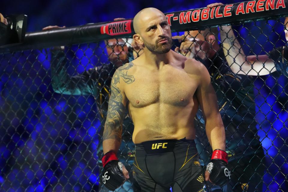 Jul 8, 2023; Las Vegas, Nevada, USA; Alexander Volkanovski (red gloves) prior to the fight against Yair Rodriguez (blue gloves) during UFC 290 at T-Mobile Arena. Mandatory Credit: Stephen R. Sylvanie-USA TODAY Sports