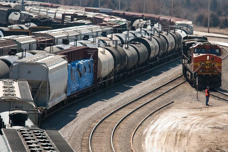 A BNSF employee directs a diesel engine into the railyards south of Galesburg on Friday afternoon. Carl Sandburg College has a collaborative agreement with BNSF and is preparing to offer a diesel technology program, as well as many electrical technology programs, beginning this fall.