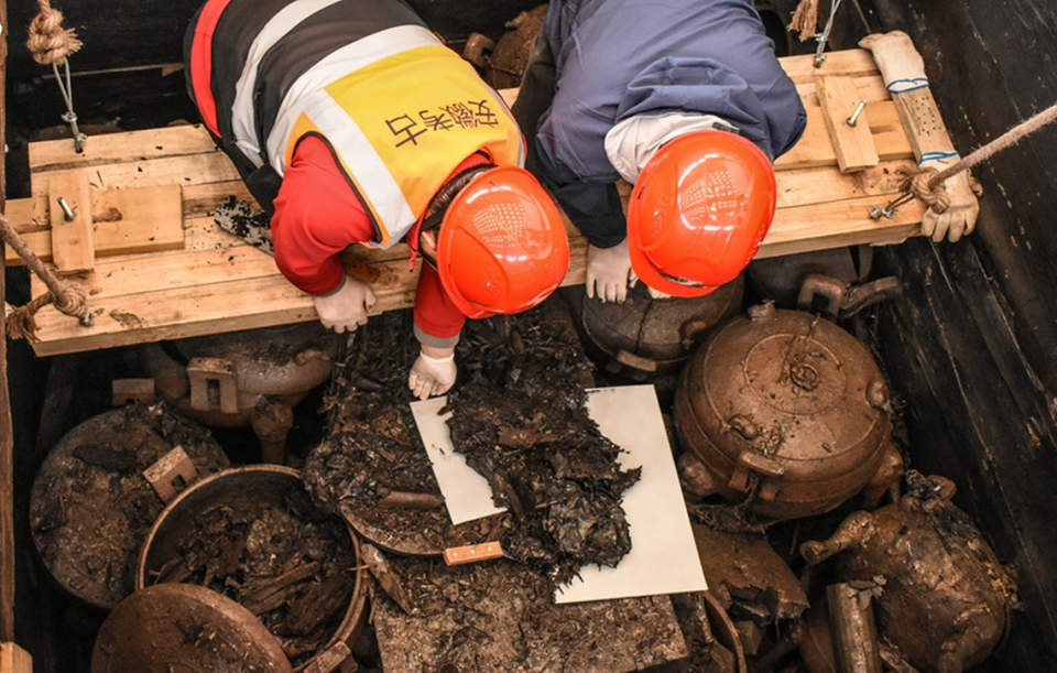 Archaeologists excavate a large collection of artifacts at Wuwangdun.