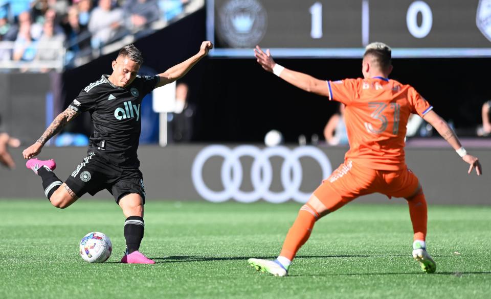 Mar 26, 2022; Charlotte, North Carolina, USA; Charlotte FC midfielder Jordy Alcivar (8) kicks the ball against FC Cincinnati at Bank of America Stadium. Mandatory Credit: Griffin Zetterberg-USA TODAY Sports