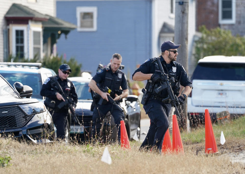 Members of law enforcement arrive at a farm   in Lisbon Falls, Maine, as the search for the suspect in the deadly mass shooting in Lewiston continues, Oct. 27, 2023. / Credit: Reuters/Kevin Lamarque