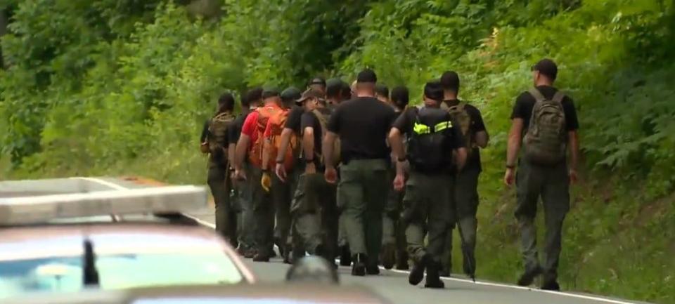 Authorities search an area in New Hampshire near where Hanson native Maura Murray disappeared in 2004 on Wednesday, July 13, 2022.