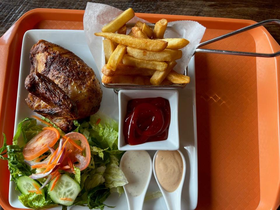 Pollo a la Brasa at Panka Peruvian Chicken in the Drake neighborhood comes with choices such as a salad and fries, the traditional sides with this dish.