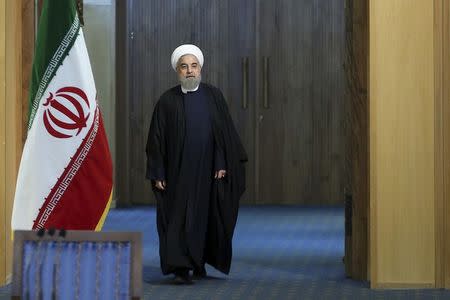 Iranian President Hassan Rouhani arrives for a news conference in Tehran, Iran January 17, 2016. REUTERS/President.ir/Handout