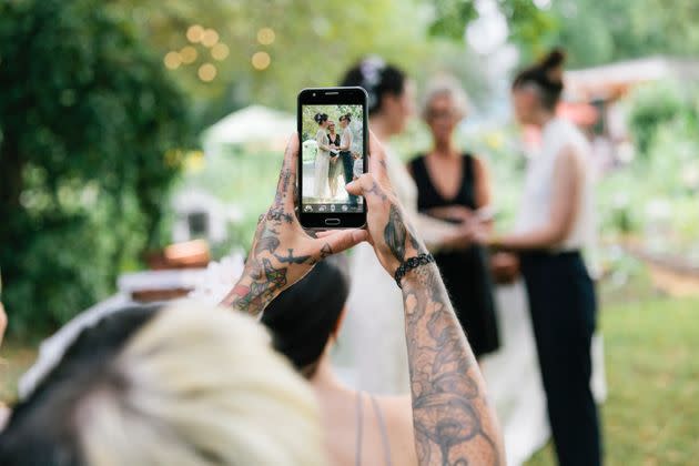 When she's a guest at a wedding, wedding planner Tracie Domino refrains from taking photos during the ceremony.