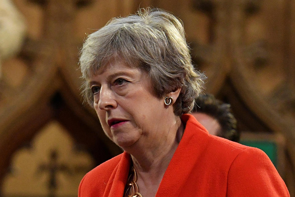 Conservative MP Theresa May walks through the Central Lobby toward the House of Lords to listen to the Queen's Speech during the State Opening of Parliament in the Houses of Parliament in London, Britain October 14, 2019. Daniel Leal-Olivas/Pool via REUTERS