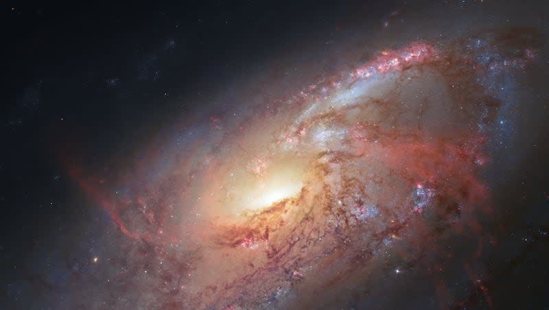 This image, made by the NASA/ESA Hubble Space Telescope, shows M106 with additional information captured by amateur astronomers Robert Gendler and Jay GaBany. The Hubble Space Telescope is marking its 34th anniversary. A full decade in the making, Hubble rocketed into orbit on April 24, 1990, aboard the space shuttle Discovery.