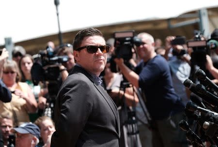 FILE PHOTO: Unite The Right rally organizer Jason Kessler attempts to speak at a press conference in front of Charlottesville City Hall in Charlottesville, Virginia, August 13, 2017. REUTERS/Justin Ide