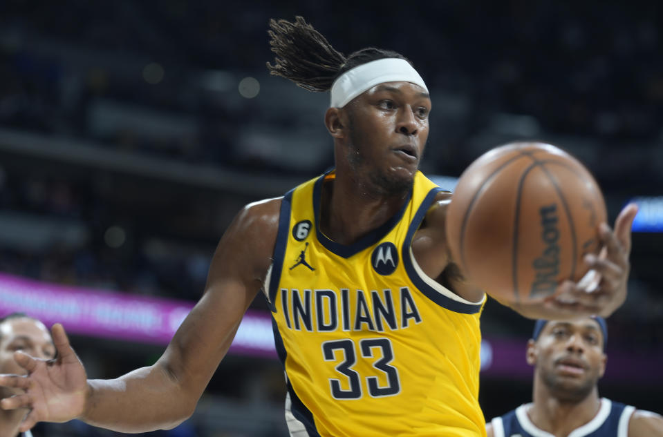 Indiana Pacers center Myles Turner pulls in a rebound during the first half of the team's NBA basketball game against the Denver Nuggets Friday, Jan. 20, 2023, in Denver. (AP Photo/David Zalubowski)