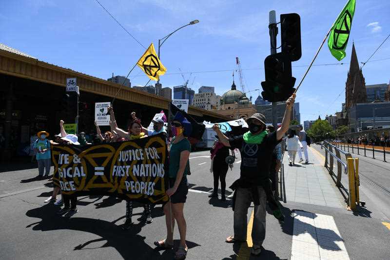 Protesters are seen during an Extinction Rebellion protest in Melbourne.