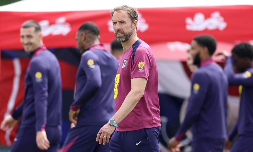 <span>Gareth Southgate oversaw training at <a class="link " href="https://sports.yahoo.com/soccer/teams/england/" data-i13n="sec:content-canvas;subsec:anchor_text;elm:context_link" data-ylk="slk:England;sec:content-canvas;subsec:anchor_text;elm:context_link;itc:0">England</a>’s Blankenhain base on Monday after starting their Group C campaign with a win.</span><span>Photograph: Richard Pelham/Getty Images</span>