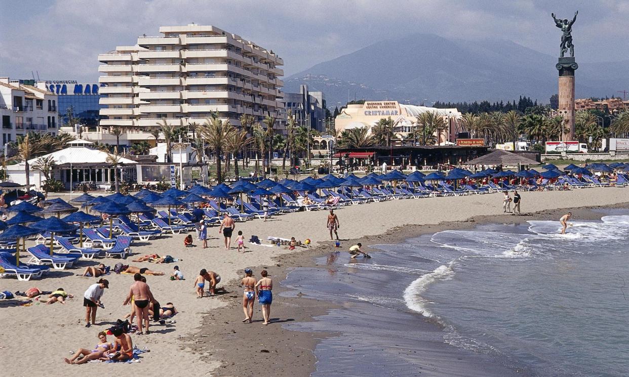 <span>‘Who’s going to find out?’ People on the beach at Marbella on the Costa del Sol.</span><span>Photograph: Interfoto Pressebildagentur/Alamy</span>