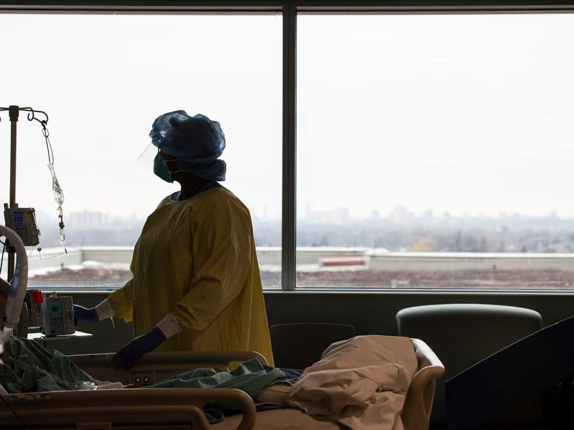 A nurse is seen working at the Humber River Hospital intensive care unit in Toronto in this file photo from Jan. 13. The number of job vacancies in the health sector has exploded, Statistics Canada data show. (Evan Mitsui/CBC - image credit)