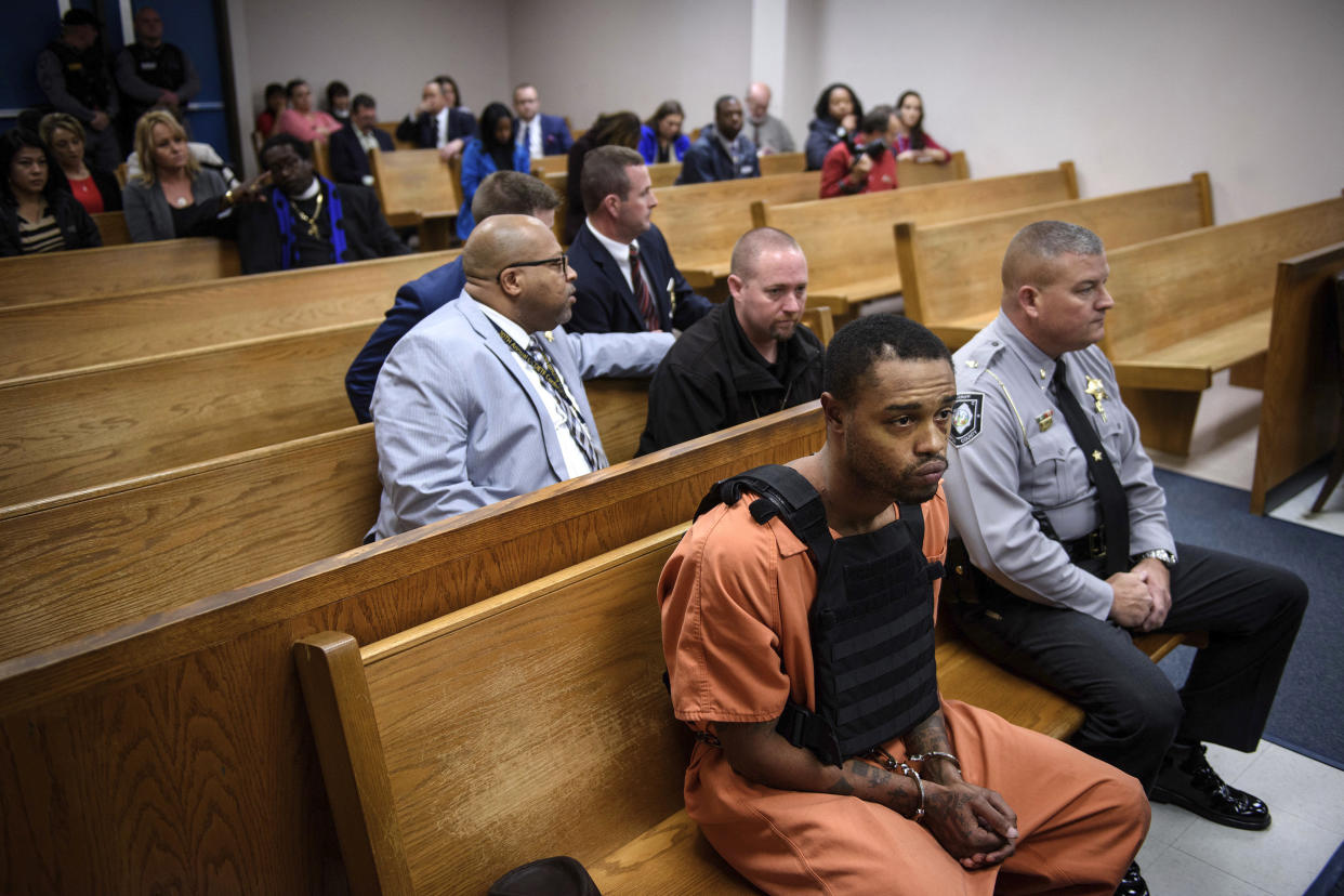 Michael Ray McLellan (front row, left), 34, appears in court, charged with the kidnapping and murder of 13-year-old Hania Aguilar, Dec. 10, in Lumberton, North Carolina. He was identified last year as a suspect in a rape but was not apprehended until after Aguilar's abduction. (Photo: ASSOCIATED PRESS)