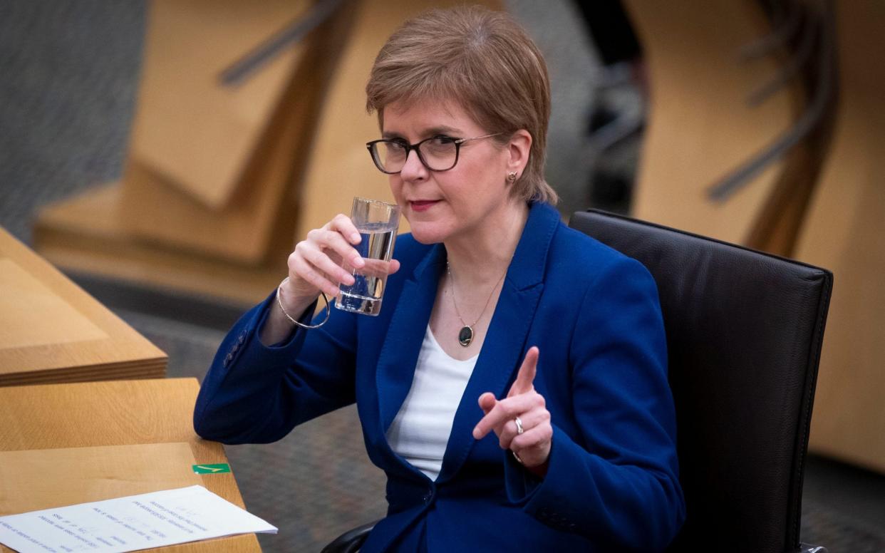 First Minister Nicola Sturgeon during First Minster's Questions in the debating chamber of the Scottish Parliament in Edinburgh - Jane Barlow/PA