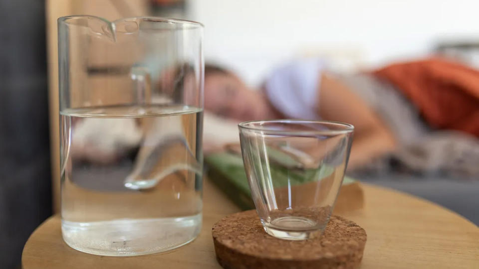 Glass of water on a nightstand