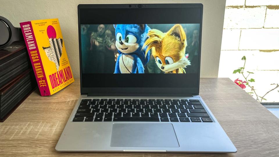 Framework Laptop 13 (2023) review unit on desk playing Sonic movie