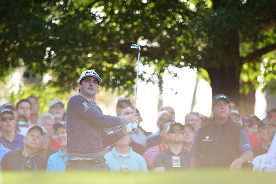 Keegan Bradley plays his shot from the fourth tee during a practice round prior to the start of the 2016 Masters Tournament at Augusta National Golf Club.