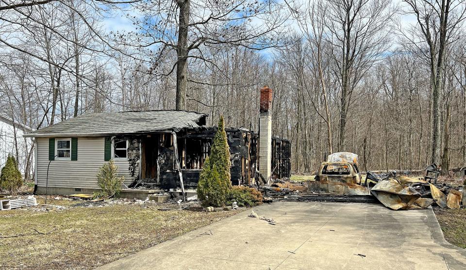 Tom Moyer, 81, was rescued from a fire that destroyed his home on Ross Road by neighbor Bryer Miller and off-duty firefighter Bailey Dretzka.