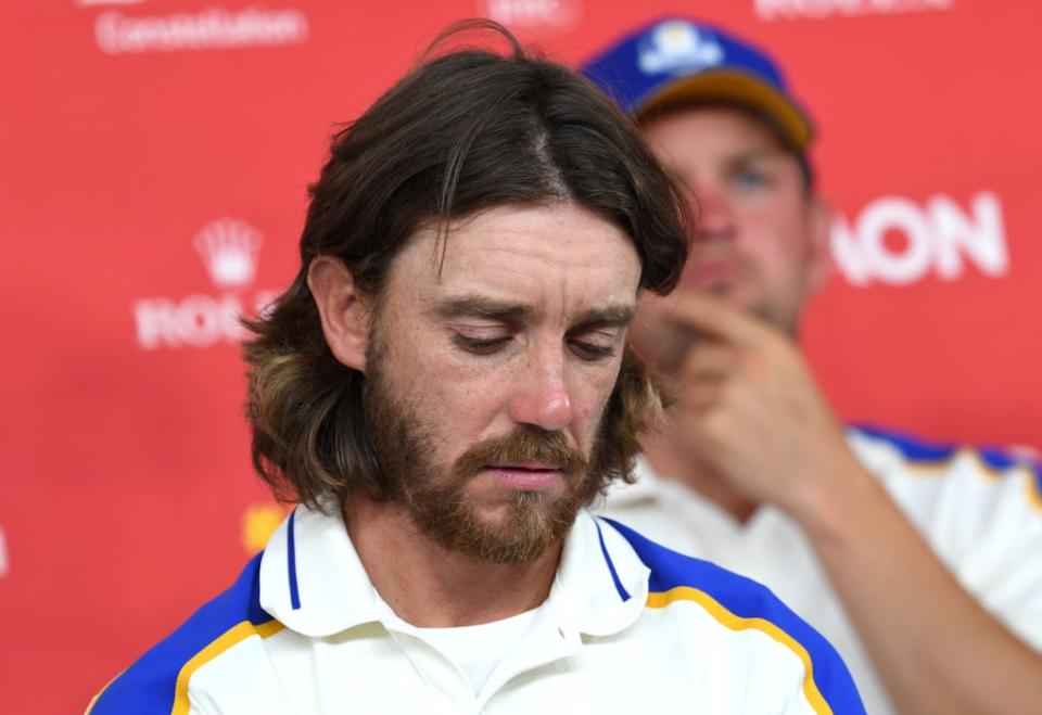 Europe’s Tommy Fleetwood looking downcast during a press conference after Europe’s Ryder Cup defeat (Anthony Behar/PA) (PA Wire)