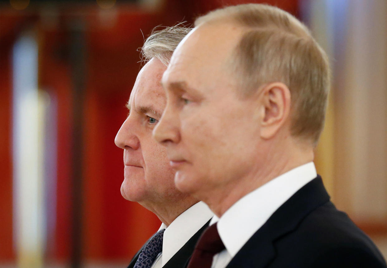 Russian President Vladimir Putin, right. and U.S. Ambassador to Russia John J. Sullivan attending a ceremony at the Kremlin in Moscow.