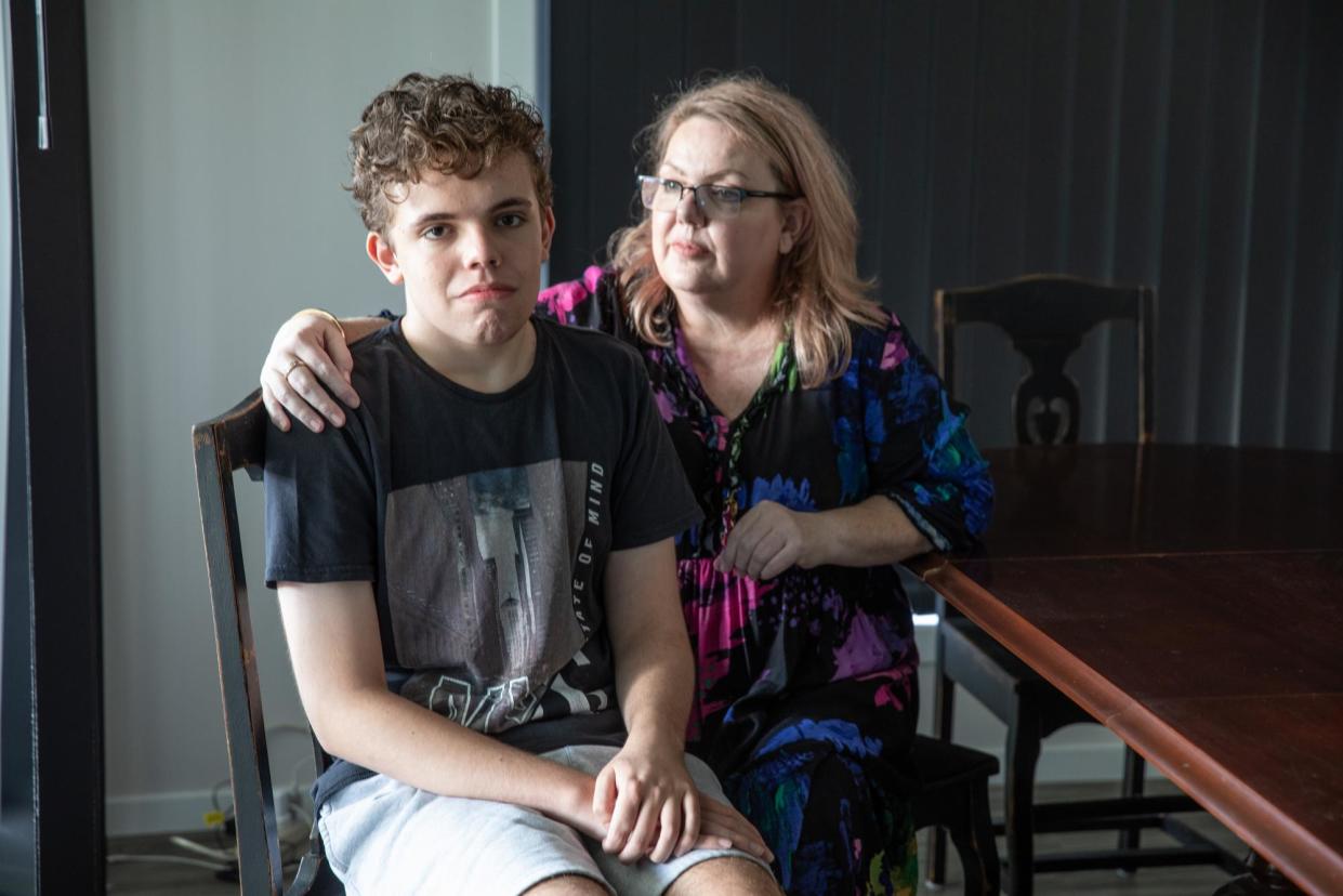 <span>Nadine Moore and her son, Liam, 19. Moore says Liam told her ‘I don’t deserve to be alive’ after being suspended from school.</span><span>Photograph: Natalie Grono/The Guardian</span>
