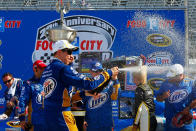 BRISTOL, TN - MARCH 18: Brad Keselowski, driver of the #2 Miller Lite Dodge, celebrates in Victory Lane after winning the NASCAR Sprint Cup Series Food City 500 at Bristol Motor Speedway on March 18, 2012 in Bristol, Tennessee. (Photo by Geoff Burke/Getty Images for NASCAR)