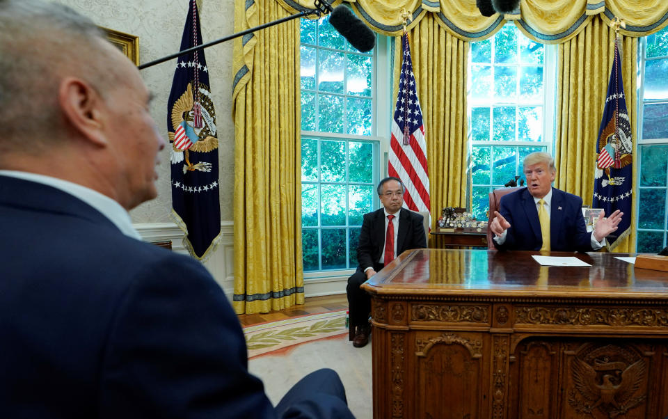 U.S. President Donald Trump talks during a meeting with China's Vice Premier Liu He in the Oval Office at the White House after two days of trade negotiations in Washington, U.S., October 11, 2019. REUTERS/Yuri Gripas