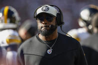 Pittsburgh Steelers head coach Mike Tomlin walks on the sidelines during the first half of an NFL football game against the Cleveland Browns, Sunday, Nov. 19, 2023, in Cleveland. (AP Photo/Ron Schwane)