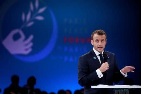 FILE PHOTO: French President Emmanuel Macron delivers a speech at the opening session of the Paris Peace Forum as part of the commemoration ceremony for Armistice Day, 100 years after the end of the First World War, in Paris, France, November 11, 2018. REUTERS/Gonzalo Fuentes/Pool